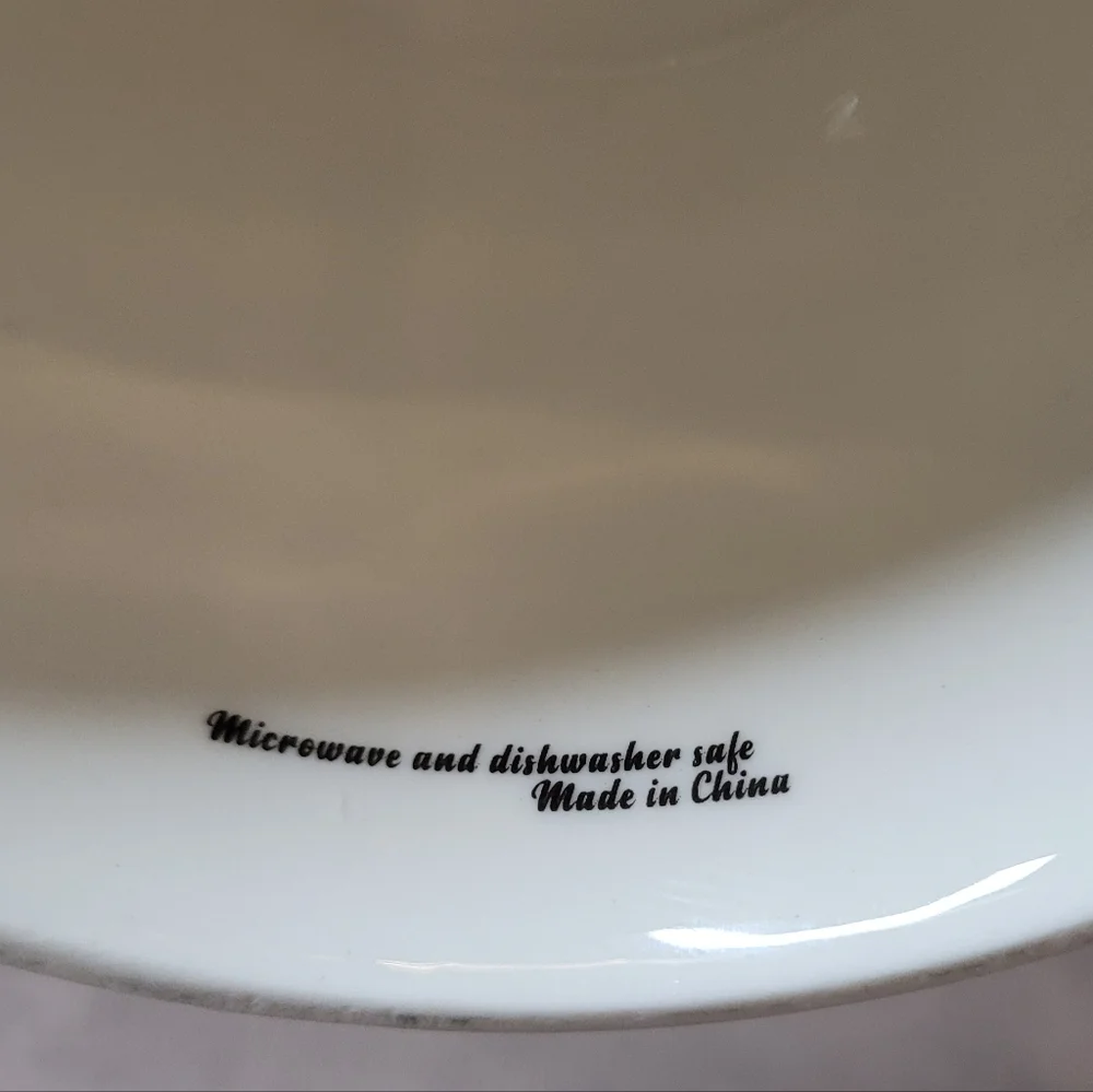 White Ceramic Elevated Cat Dish with Black Fish Skeleton Design